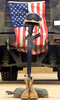 An M16-a2 Service Rifle, A Pair Of Boots And A Helmet Stand In Tribute To A Fallen Marine Corps Sergeant. Image