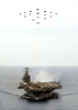 Aircraft Assigned To Carrier Air Wing Eight (cvw-8) Fly In Diamond Formation Over The Nuclear Powered Aircraft Carrier Uss Theodore Roosevelt (cvn 71). Image