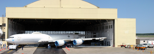 An E-6b Mercury Is Being Moved Into A Hanger At The Boeing Aerospace Support Center, Cecil Field Fla., To Be Retrofitted With A New Cockpit And An Advanced Communications Package Image
