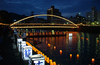Illuminated By The Albuquerque Bridge, Japanese Volunteers Place Candlelit Lanterns Into The Sasebo River During The City S Annual Obon Festival Image