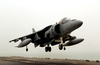 A Marine Av-8b Harrier Makes A Vertical Landing Aboard The Amphibious Assault Ship Uss Bonhomme Richard (lhd 6). Image