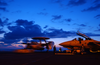 An E2-c  Hawkeye  Assigned To The Seahawks Of Early Warning Attack Squadron One Two Six (vaw 126) Is Taxied Across The Flight Deck Of Uss Harry S. Truman (cvn 75) Image