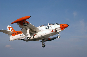 A T-2c Buckeye Flies Over The Flight Deck. Image