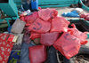 A U.s. Navy Boarding Team Operation From The Guided Missile Destroyer Uss Decatur (ddg 73) Discovered Over 50 Bags Of Hashish, Weighting 70 Pound Each. Image
