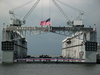 The Ensign Is Lowered For The Last Time As The Floating Drydock Resolute (afdm 10) Is Deactivated Following 58 Years Of Service Image