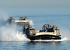 Landing Craft Air Cushion (lcac) Craft Approach The Amphibious Assault Ship Uss Kearsarge (lhd 3) Image