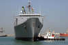 Tugboats Ease The Military Sealift Command (msc) Fast Sealift Ship Usns Bellatrix (t-akr 288) Into The Port Of Mina Ash-shu Image