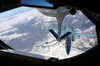 An U.s. Navy F-14b Tomcat Assigned To The  Swordsmen  Of Fighter Squadron Three Two (vf-32) Receives Fuel From An Air National Guard Boeing Kc-135 Stratotanker. Image