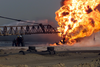 Firefighters Fight An Oil Blaze In Gas-oil Separation Plant Six As Part Of Their Ongoing Support Of Operation Iraqi Freedom. Image