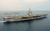The Nuclear Powered Aircraft Carrier Uss Enterprise (cvn 65) Completes An Extensive Weapons On-load With The Fast Combat Support Ship Uss Detroit (aoe 4). Image