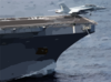 A F/a-18f Super Hornet Launches From The Bow Of Uss John C. Stennis (cvn 74). Clip Art