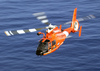 Coast Guard Hh-65a Rescue Helicopter Performs A Homeland Security Flight Over The Waters Of Near Oahu, Hawaii Image