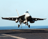 An F/a-18e  Super Hornet  Assigned To The  Eagles,  Of Strike Fighter Squadron One One Five (vfa-115) Makes An Arrested Landing Aboard Ship. Image