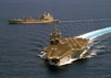 The Uss Enterprise (cvn 65) Pulls Away From The Military Sealift Command Fast Combat Support Ship Usns Leroy Grumman (t-ao 195) During An Emergency Breakaway Drill Image