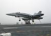 An F/a-18 Hornet Assigned To The Checkerboards Of Marine Strike Fighter-attack Squadron Three One Two (vmfa-312) Lands On The Flight Deck Aboard Uss Enterprise (cvn 65). Image