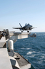 F/a-18 Hornet Launches From Uss Abraham Lincoln Cvn 72 Image