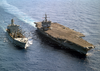 The Uss Enterprise (cvn 65) Steams Alongside The Military Sealift Command Fast Combat Support Ship Usns Leroy Grumman (t-ao 195) During An Underway Replenishment (unrep) Image