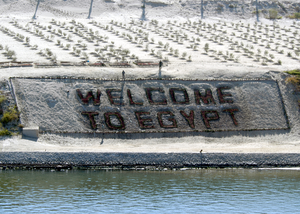 Welcome To Egypt Is Clearly Marked To Show That The Suez Canal Offers Safe Passage To Those Who Transit The Waterway, Which Is Used Daily By A Variety Of Ships, From Commercial Vessels To Military Warships. Image