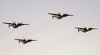 Four C-2a  Greyhounds,  Assigned To The  Providers  Of Fleet Logistic Support Squadron Thirty (vrc-30), Flyover Uss John C. Stennis (cvn-74) Image