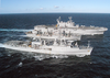 The Auxiliary Fleet Oiler Spica Prepares To Conduct A Simultaneous Refueling At Sea (ras) With Amphibious Assault Ship Uss Saipan (lha 2) And Amphibious Transport Dock Uss Ponce (lpd 15) Image