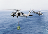 Two Mh-60s Knight Hawks Assigned To The Providers Of Helicopter Combat Support Squadron Five (hc-5) Image