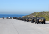 Elements Of The 1st And 3rd Light Armored Reconnaissance (lar) Units Line Up To Be Loaded On To Landing Craft Air Cushion (lcac) Vehicles. Image
