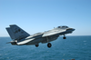 An F-14d Tomcat Assigned To The  Tomcatters  Of Fighter Squadron Three One (vf-31) Launches From The Flight Deck Aboard The Aircraft Carrier Uss Abraham Lincoln (cvn 72) Image