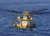 A Ch-53e Flies Over The Atlantic Ocean At Sunrise During Deck Landing Qualification Clip Art