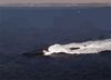 A Los Angeles Class Fast-attack Submarine Steams Along On The Surface Of The Pacific Ocean. Clip Art