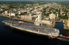 Tug Boats Guide Uss Harry S. Truman (cvn 75) Up The Elizabeth River, Past Portsmouth Landmarks, To The Norfolk Naval Shipyard Image