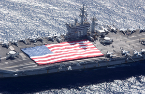 Uss Nimitz (cvn 68) And Carrier Air Wing Eleven (cvw-11) Personnel Participate In A Flag Unfurling Rehearsal Image