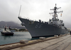 A Tug Boat Assists The U.s. Navy Guided Missile Destroyer Uss Gonzalez (ddg 66) Into Port Image