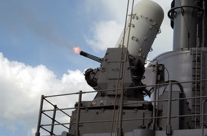 The Guided Missile Cruiser Uss Vincennes (cg 49) Fires A Close In Weapons System (ciws) While Under Way In The Pacific Ocean. Image