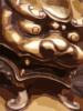 Closeup Of Brass Chinese Lion Statue Clip Art