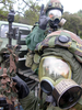 Seabees Assigned To Naval Mobile Construction Battalion Forty (nmcb-40) Don Protective Suits During A Simulated Chemical/biological Attack Conducted During A Field Training Exercise Image