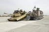 A Landing Craft Air Cushion (lcac) From The Uss Tarawa (lha 1) Amphibious Ready Group (arg) Offloads An M1-a1 Abrams Tank Image