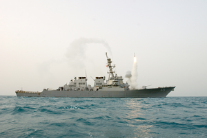 The Guided Missile Destroyer Uss Milius (ddg 69) Launches A Tomahawk Land Attack Missile (tlam) Toward Iraq. Image
