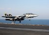 An F-14  Tomcat  From The  Jolly Rogers  Of Fighter Squadron One Zero Three (vf-103) Launches From The Waist Catapult Aboard Uss George Washington (cvn 73) Image