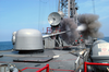 The 62 Caliber Three-inch Gun Aboard The Guided Missile Frigate Uss Curts (ffg 38) Fires A Projectile Off The Ship S Port Side. Image