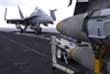 An F/a-18 Hornet Is Tied Down On The Bow Of The Flight Deck Aboard The Aircraft Carrier Uss Harry S. Truman (cvn 75). Image