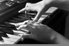 Hands Playing Piano Image