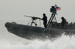 Naval Special Warfare Combatant-craft Crewmen Operate A Rigid Hull Inflatable Boat Image