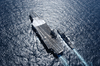 Guided Missile Destroyer Uss John Paul Jones (ddg 53) Pulls Along Side Aircraft Carrier Uss John C. Stennis Image