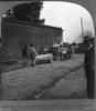 The Chinese Substitute For Horse Power - Manipulating A Huge Stone Roller On The Streets Of Nanking, China Image