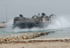 A Landing Craft, Air Cushion (lcac) Assigned To Assault Craft Unit Five (acu-5) Transports Equipment. Image