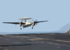 An E-2c Hawkeye Makes Its Final Approach To The Aircraft Carrier John F. Kennedy (cv 67) After Completing A Training Mission. Clip Art