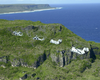 Two Uh-46  Sea Knights  And Three Uh-60  Black Hawks  Fly Over The Northern Tip Of Guam As Part Of A Six-helicopter Formation During Flight Training. Image