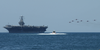 An Acrobatic Group Of Spain Aircraft Perform Aerial Maneuvers Over Uss Theodore Roosevelt (cvn 71), Anchored Off The Coast Of Cartagena, Spain Image