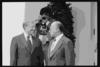 [president Jimmy Carter And Israeli Prime Minister Menachem Begin Talk At The White House, Washington, D.c., As A Photographer Adjusts His Camera In The Background] Clip Art