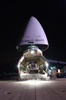 Seabees Of Naval Mobile Construction Battalion Forty (nmcb 40) Load Equipment Onto An Air Mobility Command (amc) C-5  Galaxy  Cargo Plane. Image